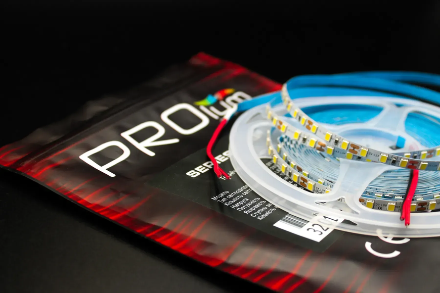 Світлодіодна стрічка DC12V IP20 нейтральна біла, 5ММ. PROLUM 2835-120. (Котушка. Ціна за метр) 320117 фото